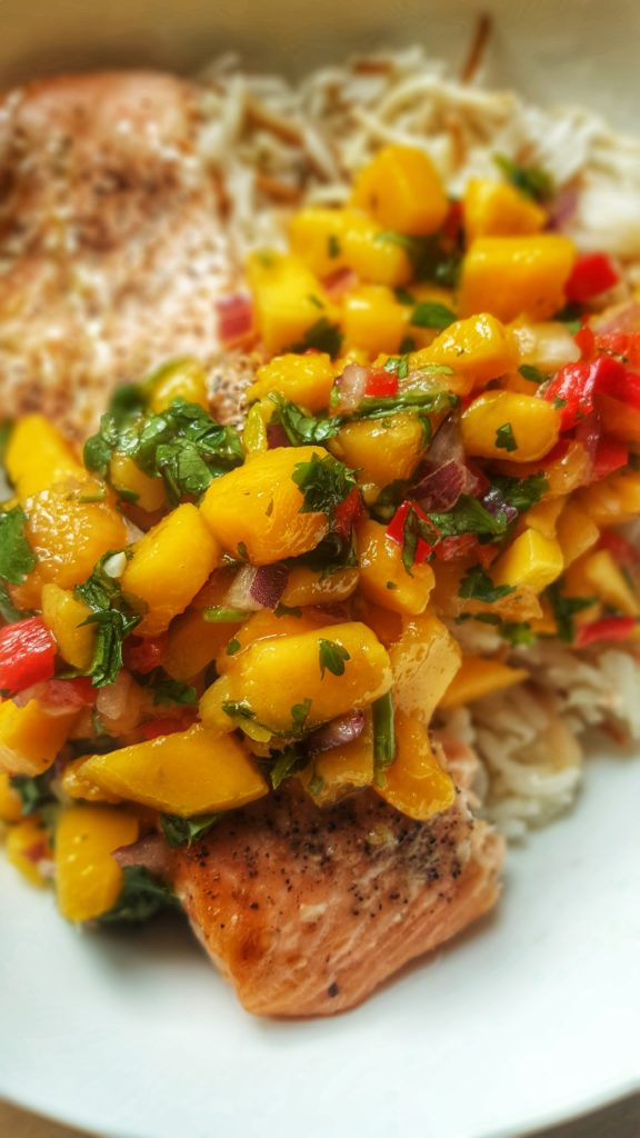 Healthy baked salmon with mango and coriander salsa